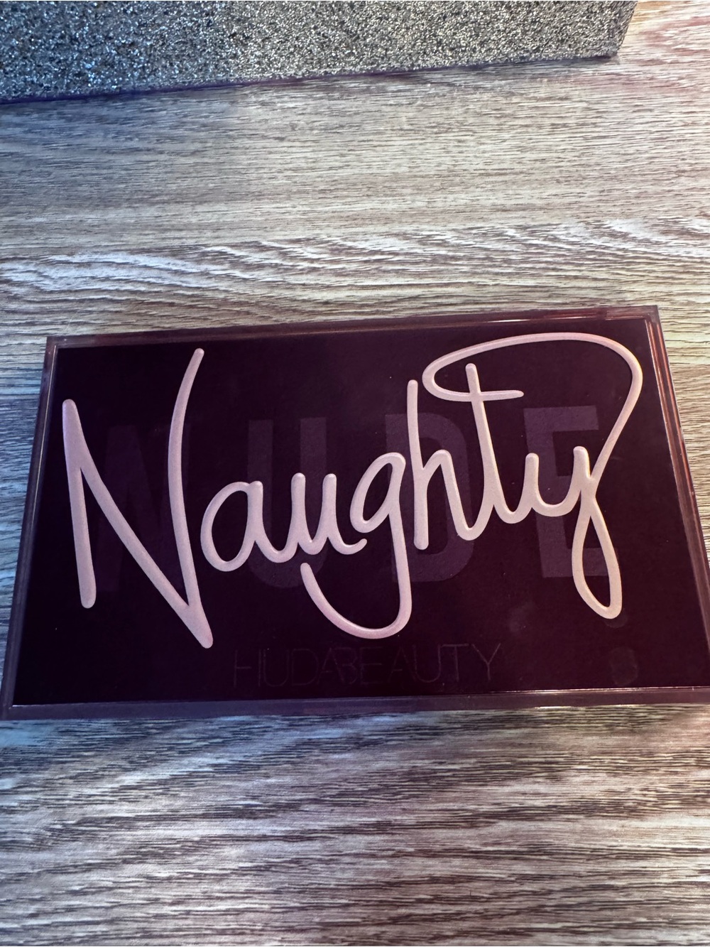 HUDA BEAUTY Naughty Eyeshadow Palette - Plum Case with Pink Script